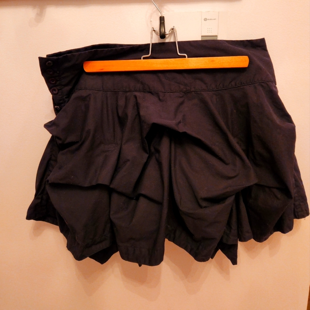 Black mini skirt with pick ups